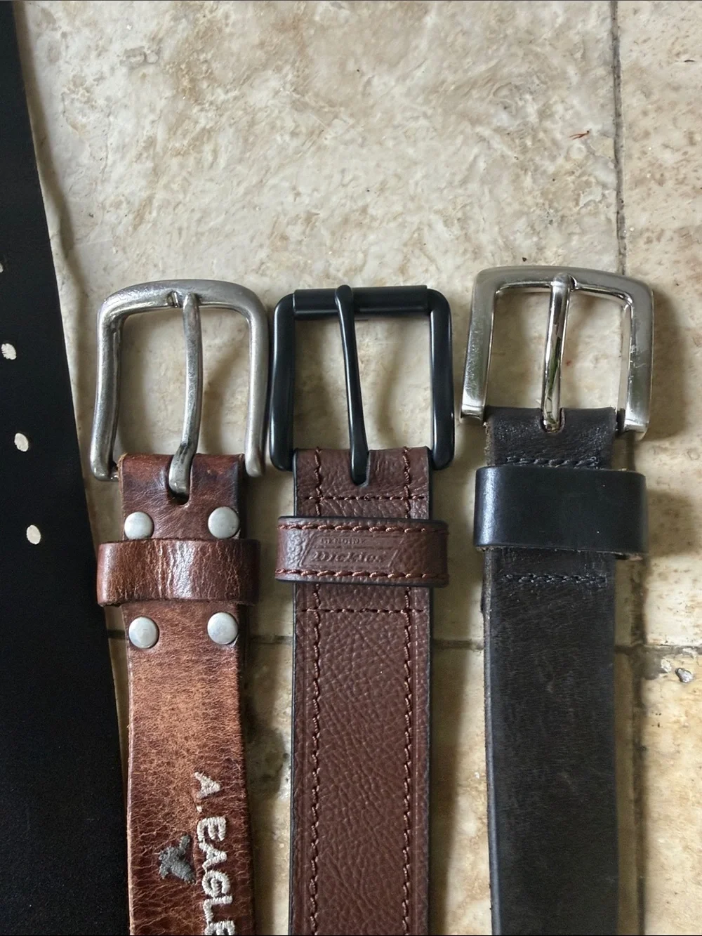 Men’s leather belts (3)  one American Eagle, one dickies and one no brand all 38